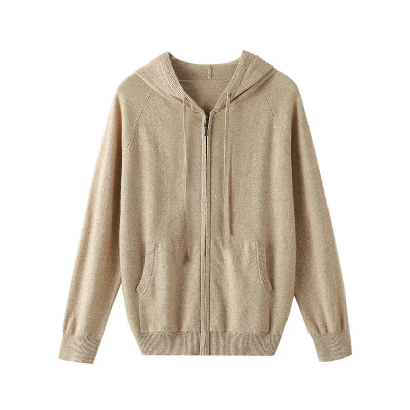 Man wearing a solid-colour hooded zip-up knitted cardigan in a business casual setting.