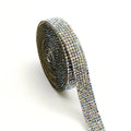 Self-adhesive strip with rows of sparkling electroplated glass rhinestones in white and iridescent colours