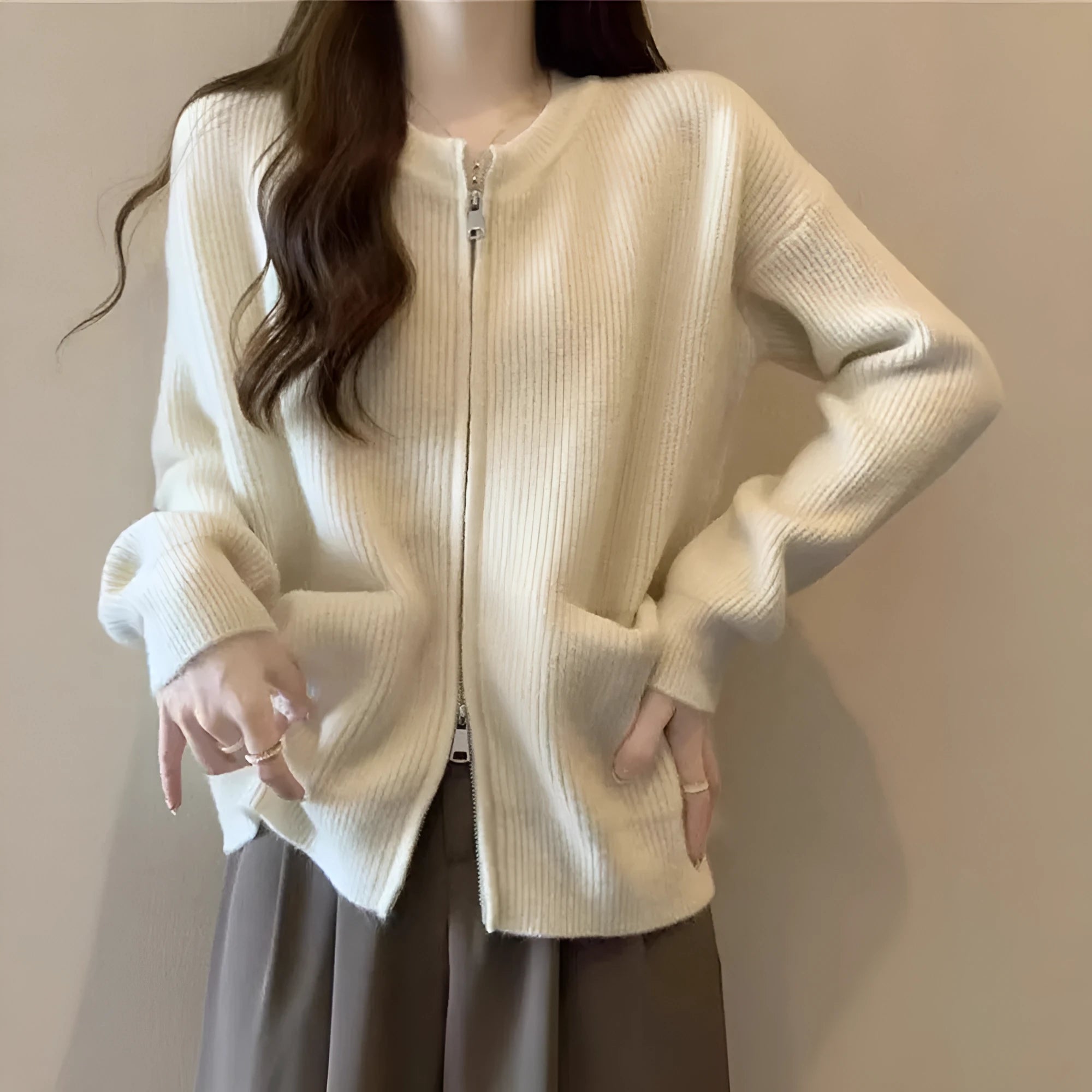 Women's beige soft wind sweater coat cardigan with long sleeves on hanger
