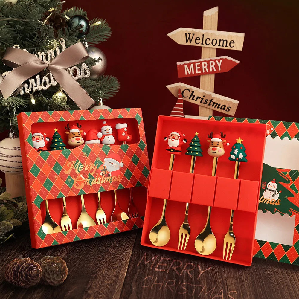 Red stainless steel Christmas spoon and fork set with snowman and Christmas tree designs