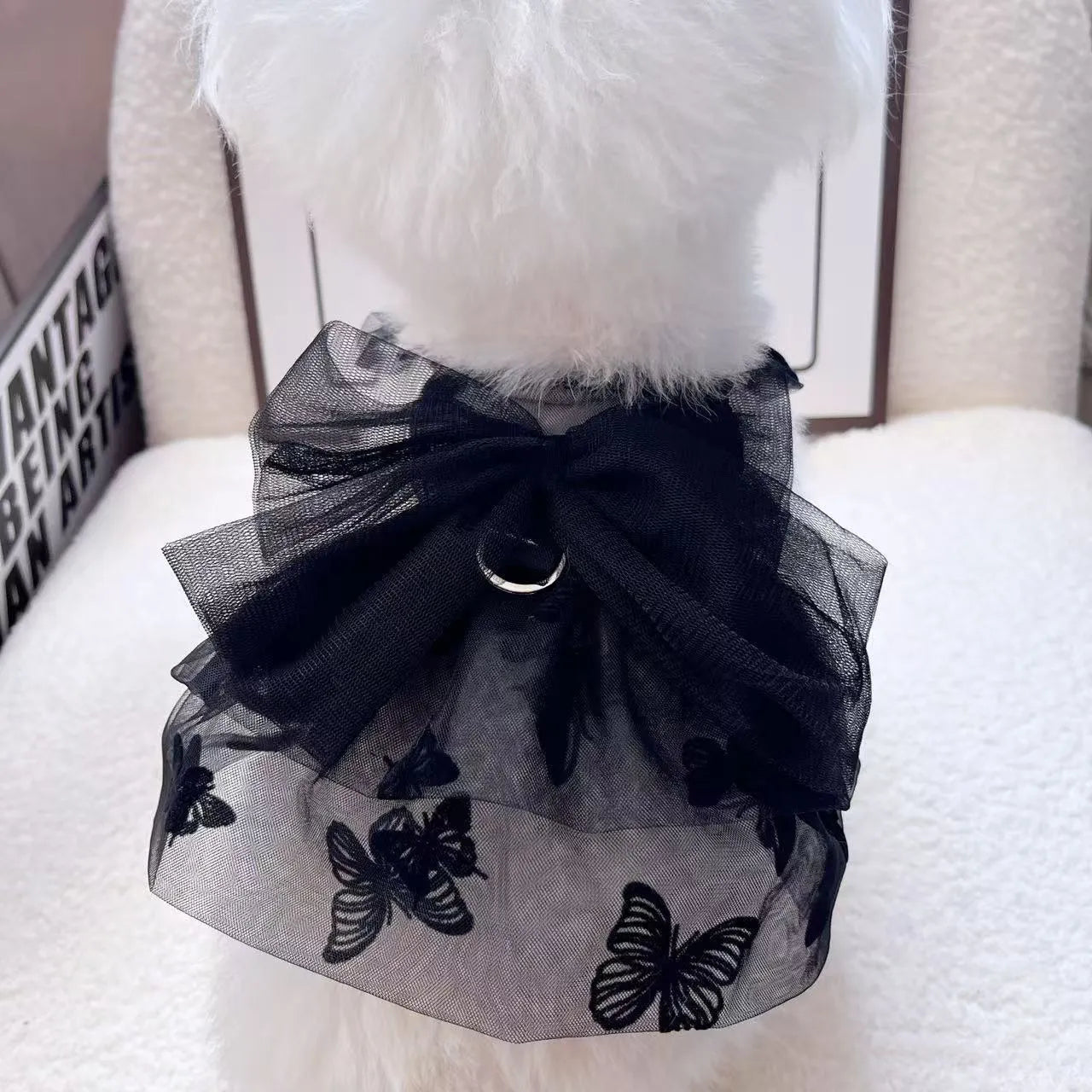 Black gauze princess tulle skirt for a small dog or cat on a white background.