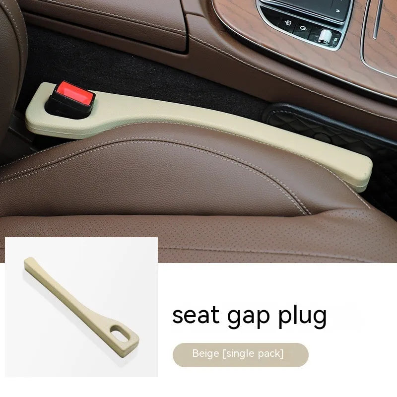 Black polyurethane car seat gap strip preventing items from falling between vehicle seats.