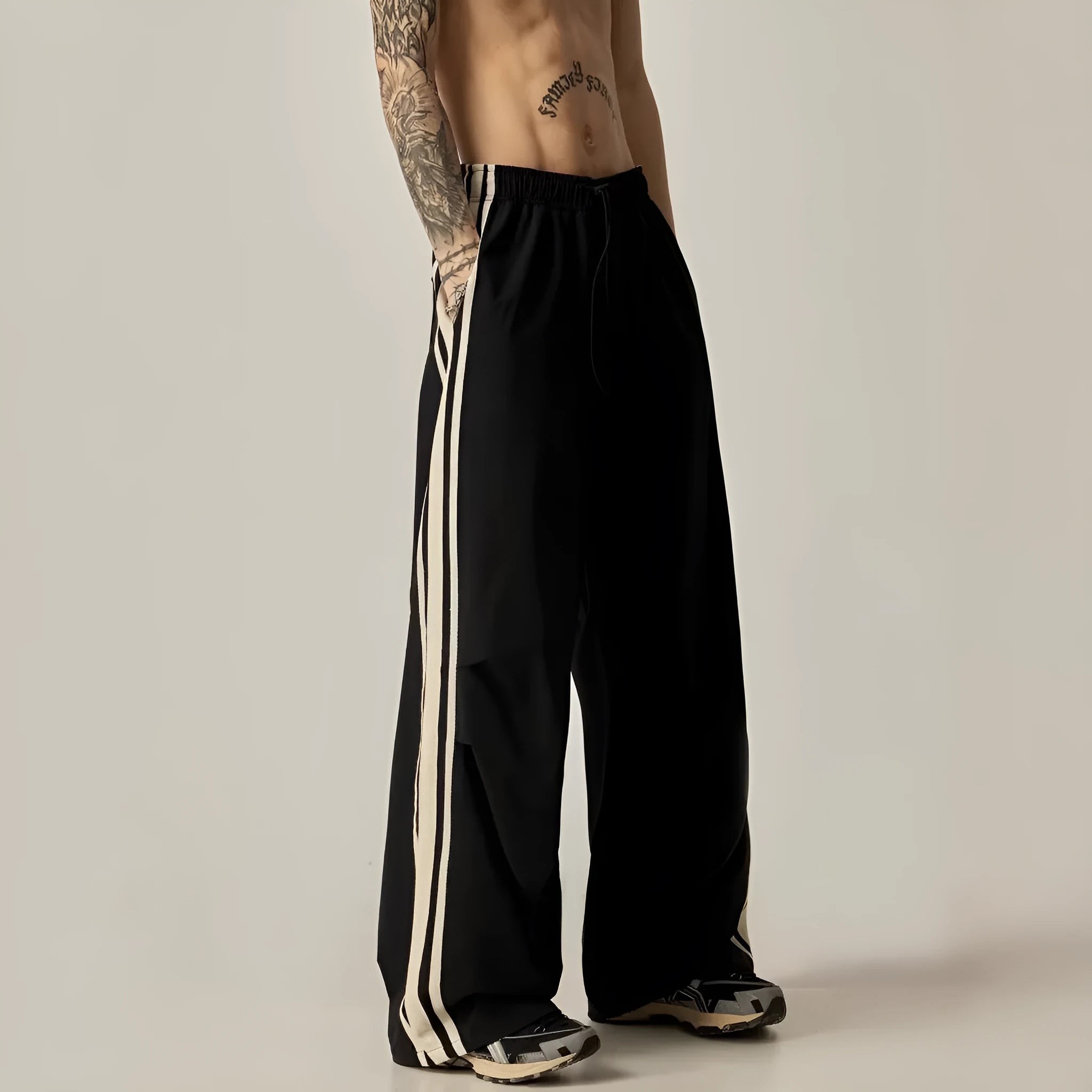 Black wide leg climbing trousers for men with high waist and straight leg cut