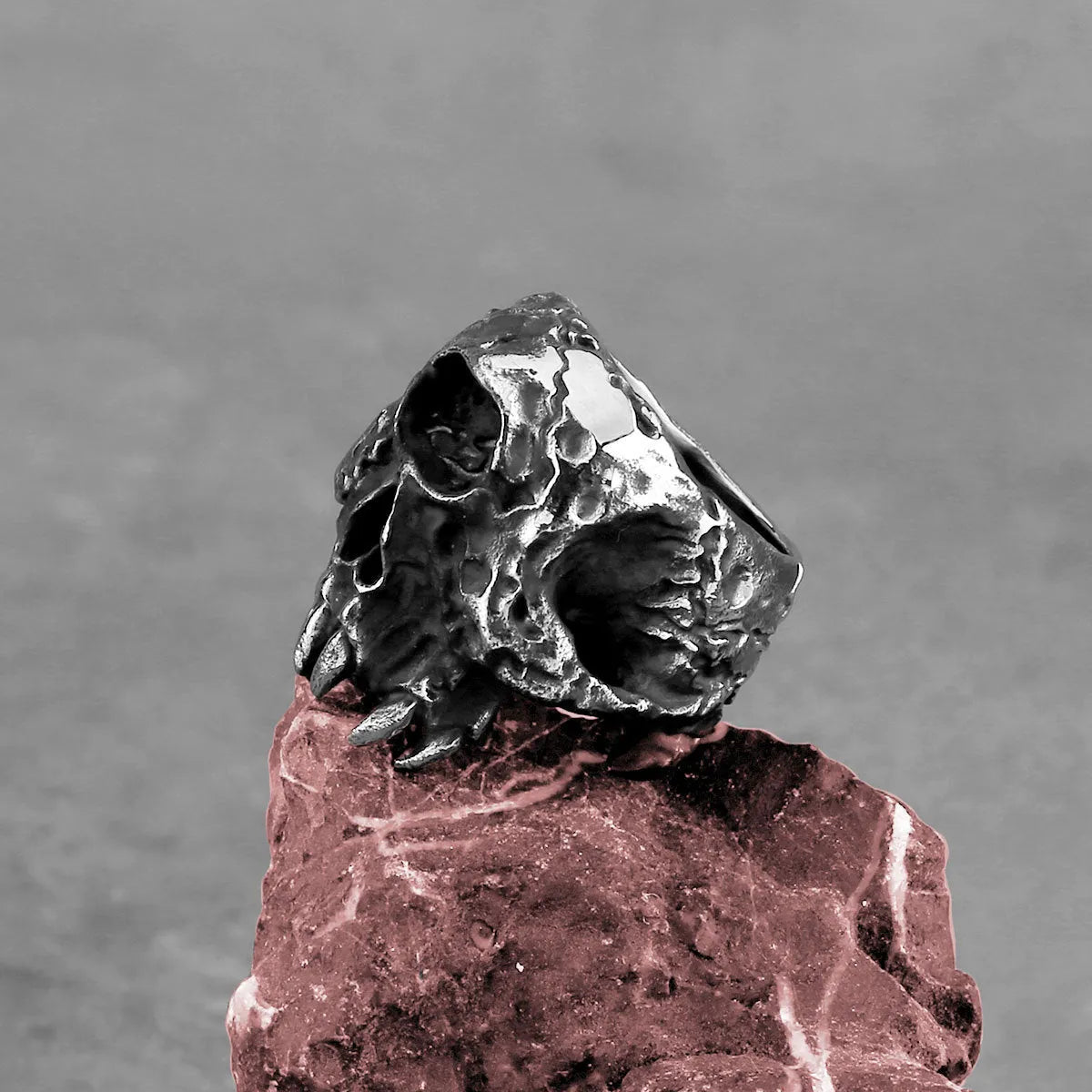 Retro punk alloy ring with a detailed one-eyed skull design and electroplated finish.