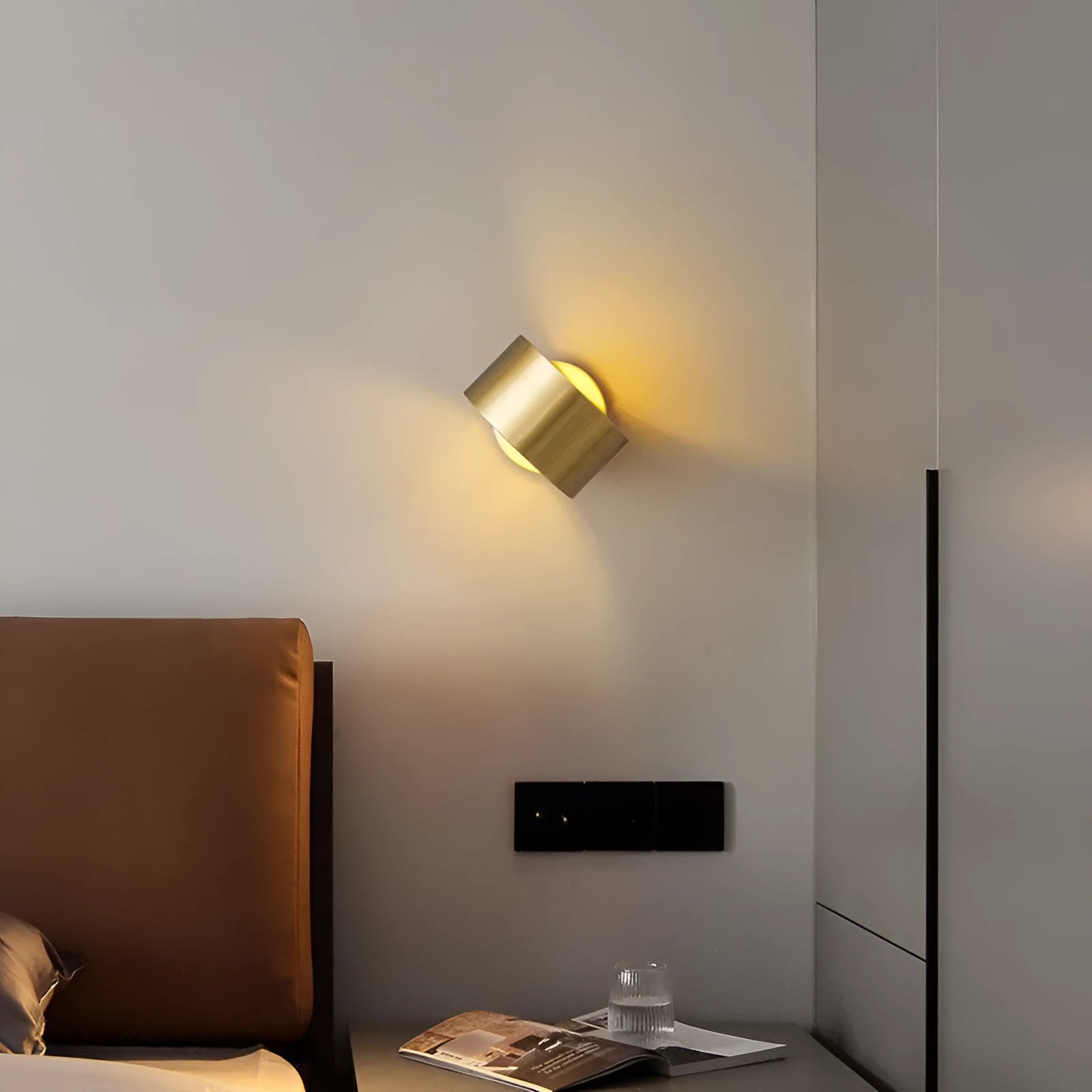 Modern simple style copper wall lamp in gold or black finish for living room.