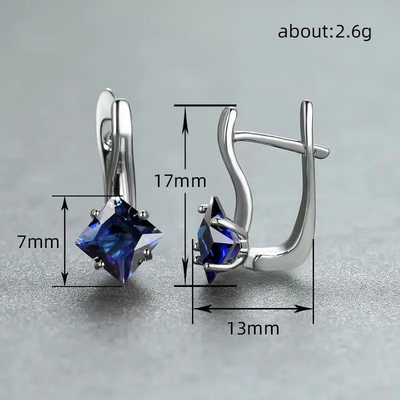 Women's copper earrings with inlaid zircon creating a diamond design, shown in blue, green, and colour options.