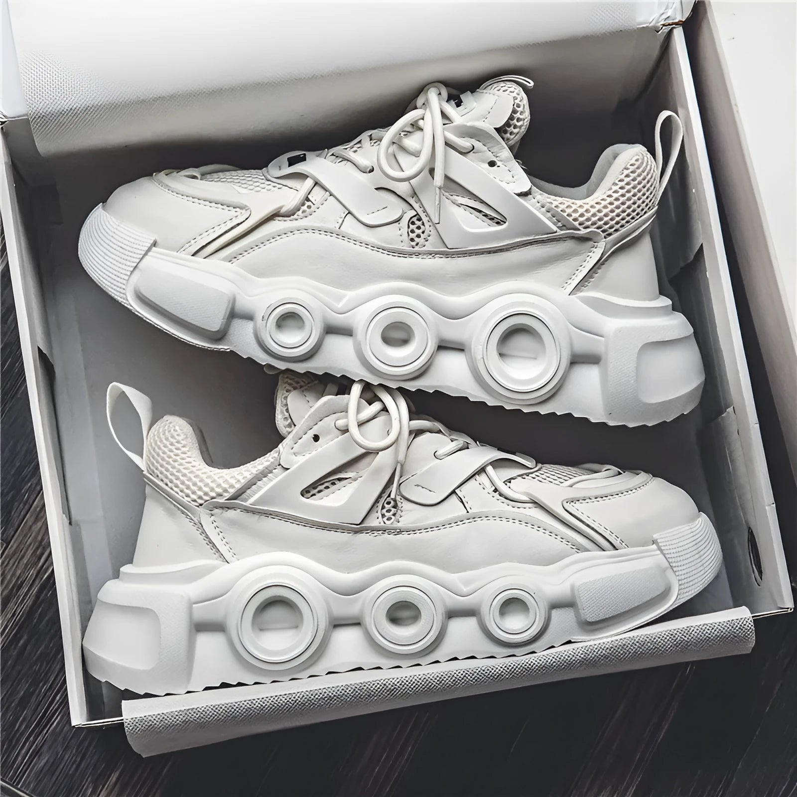 Men's low-top casual sneakers with mesh upper and thick rubber sole in black, grey, or white.