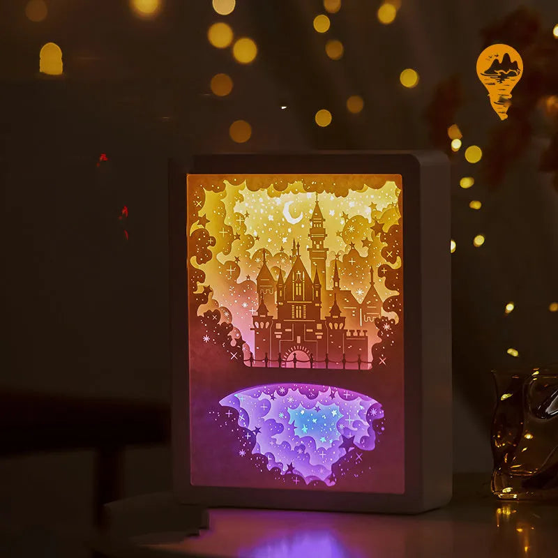 Modern bedside night light with three-dimensional paper carving design showing yellow illumination through ABS and acrylic frame