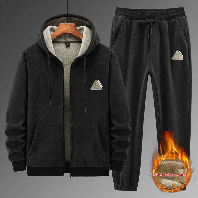 Grey cashmere hooded sweater and cotton pants two-piece sports suit laid flat.