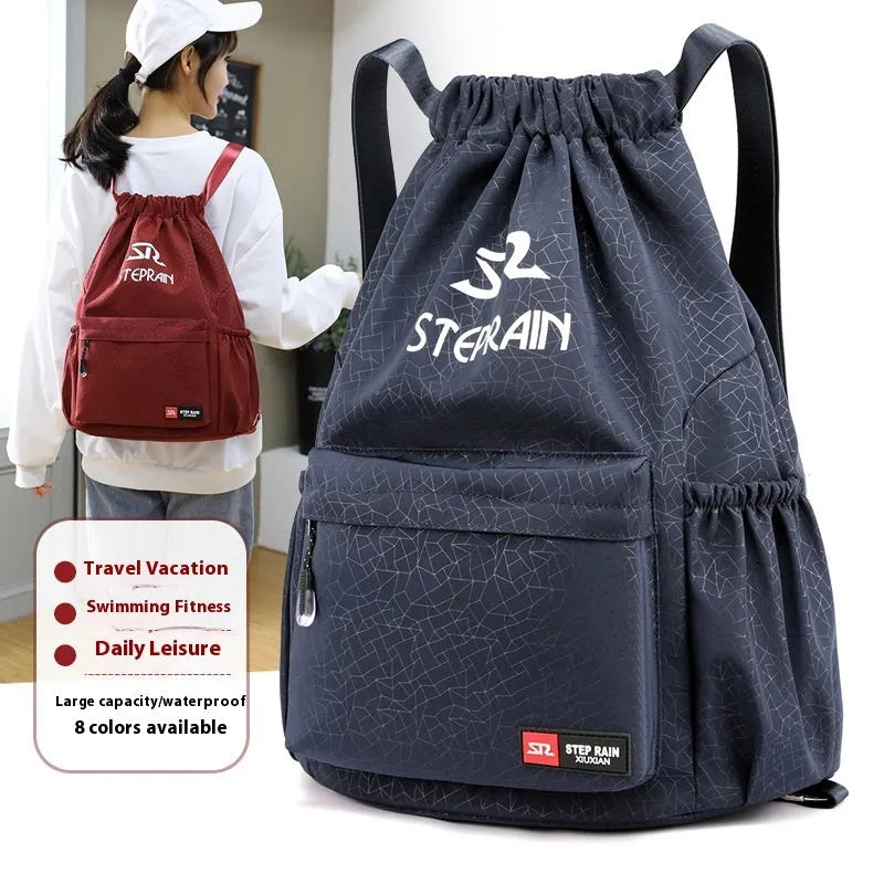 Solid colour drawstring backpack in Oxford cloth with double straps and a water pillow belt.
