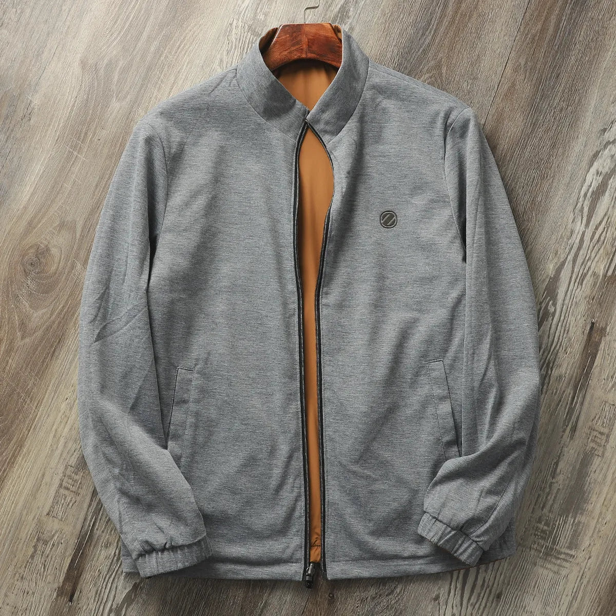 Men's simple stand collar jacket in army green colour, showing regular fit and sleeve design.