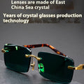 Dark green crystal frameless sunglasses with glasses case and lens cloth