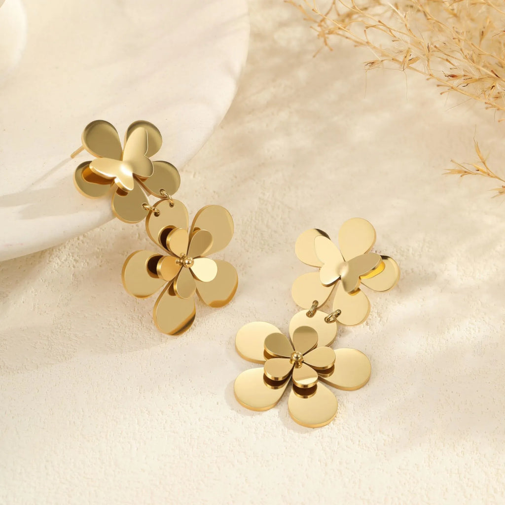 Gold-coloured stainless steel butterfly flower earrings with geometric and zodiac design elements