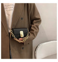 PU chain shoulder messenger phone bag in black, horizontal square shape with soft handle and crossbody strap