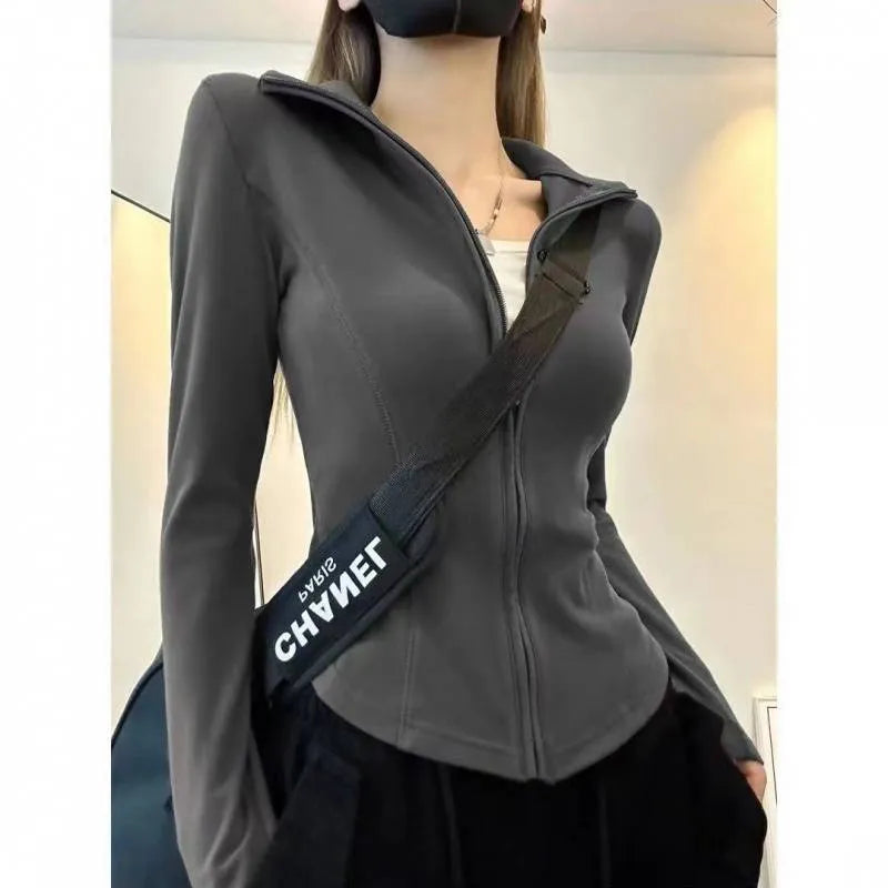 Women's slim fit Dralon cardigan with full zip front and flying sleeves in solid black colour
