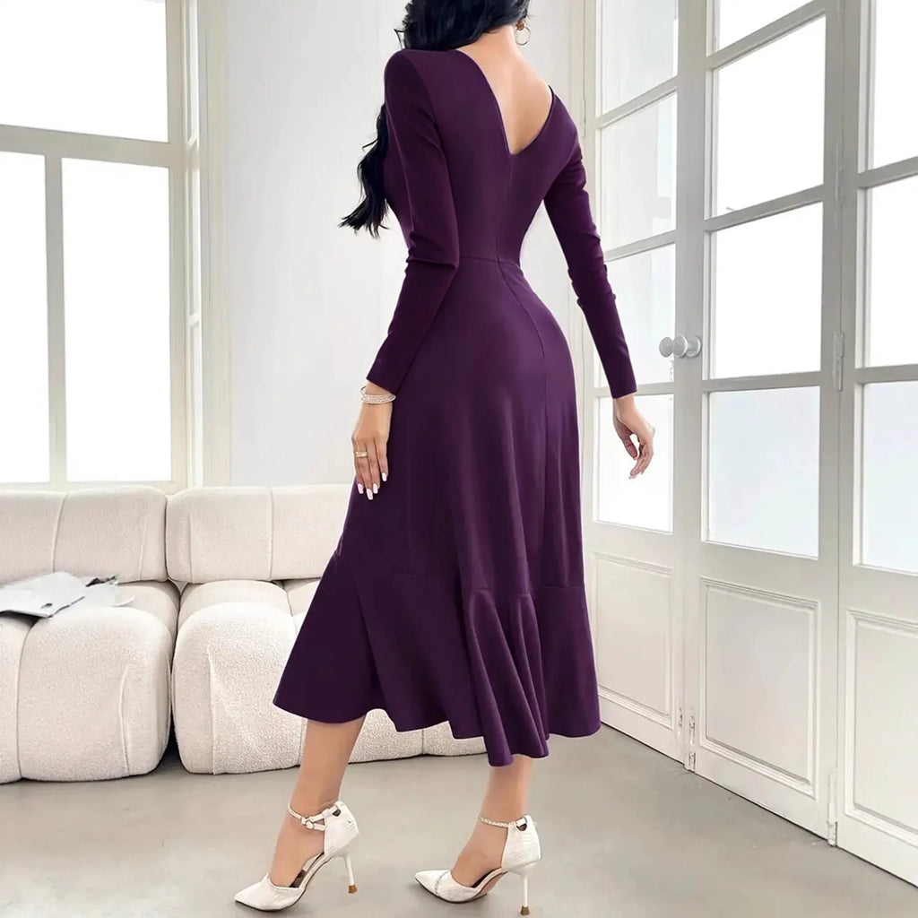 Purple women's long sleeve pullover dress with a round neck and mid waist ruffles.