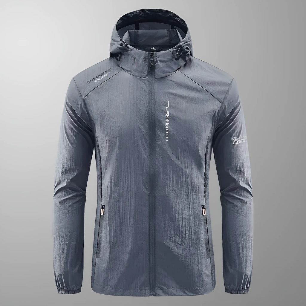 Men's loose-fit light grey nylon hooded jacket for summer outdoor wear.