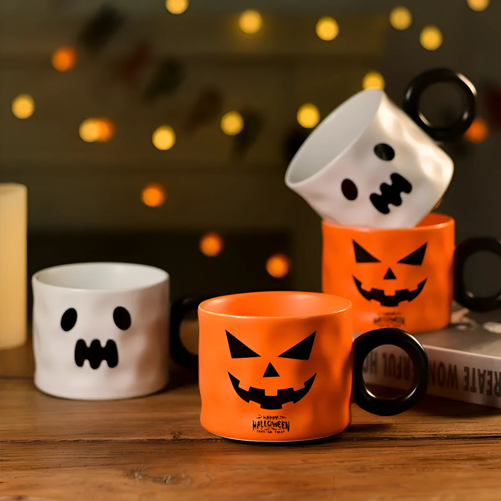Orange ceramic Halloween pumpkin mug with handle and dessert spoon in gift box packaging
