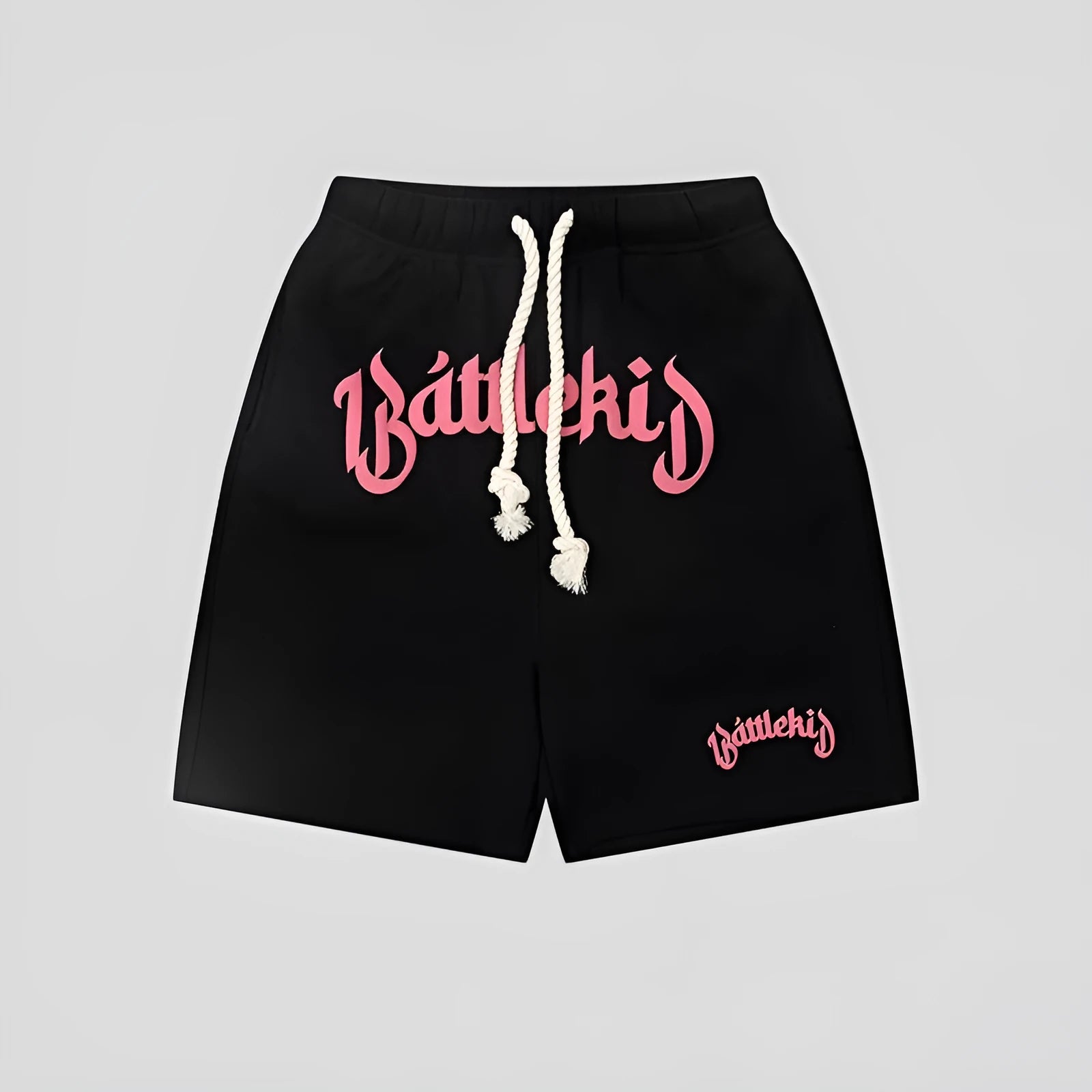 Man wearing loose-fit black cotton-blend cropped shorts in a streetwear style.