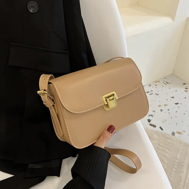Soft PU leather women's small square shoulder bag in black with one-shoulder underarm carry design