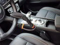 Red iron car steering wheel wire rope lock with copper core for General Motors vehicles.