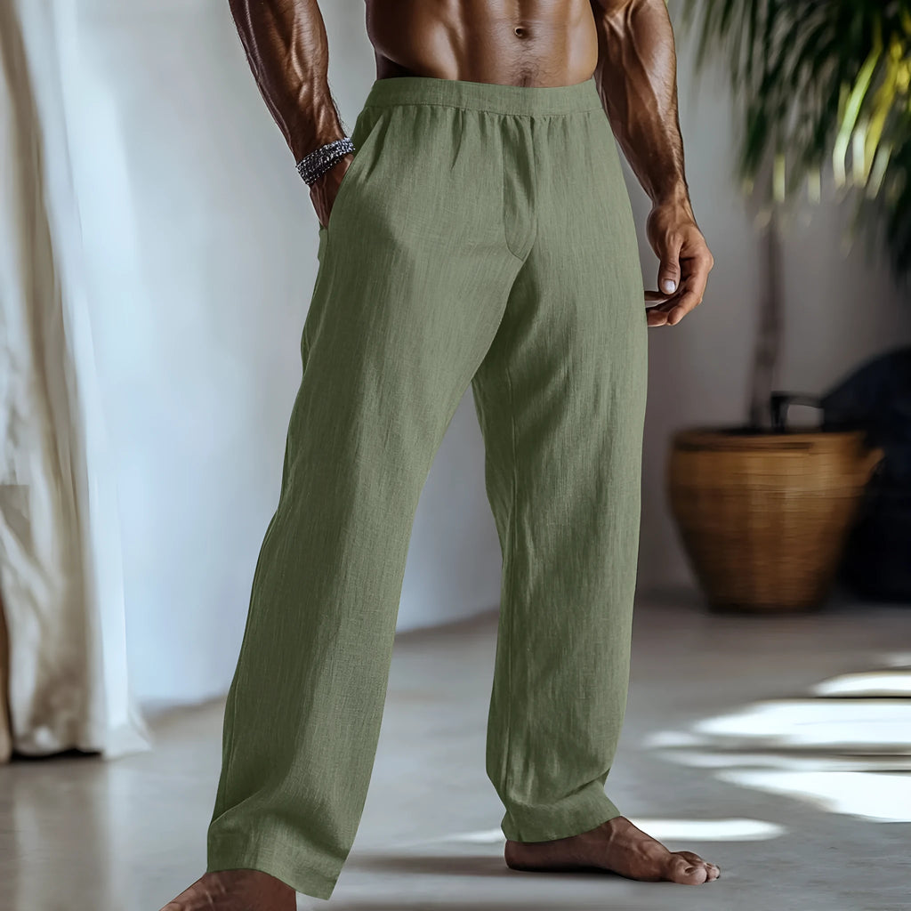 Cotton and linen straight-leg casual trousers in a solid colour with visible pockets.