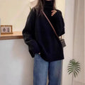 Women's thick turtleneck sweater with curling pile collar in loose fit