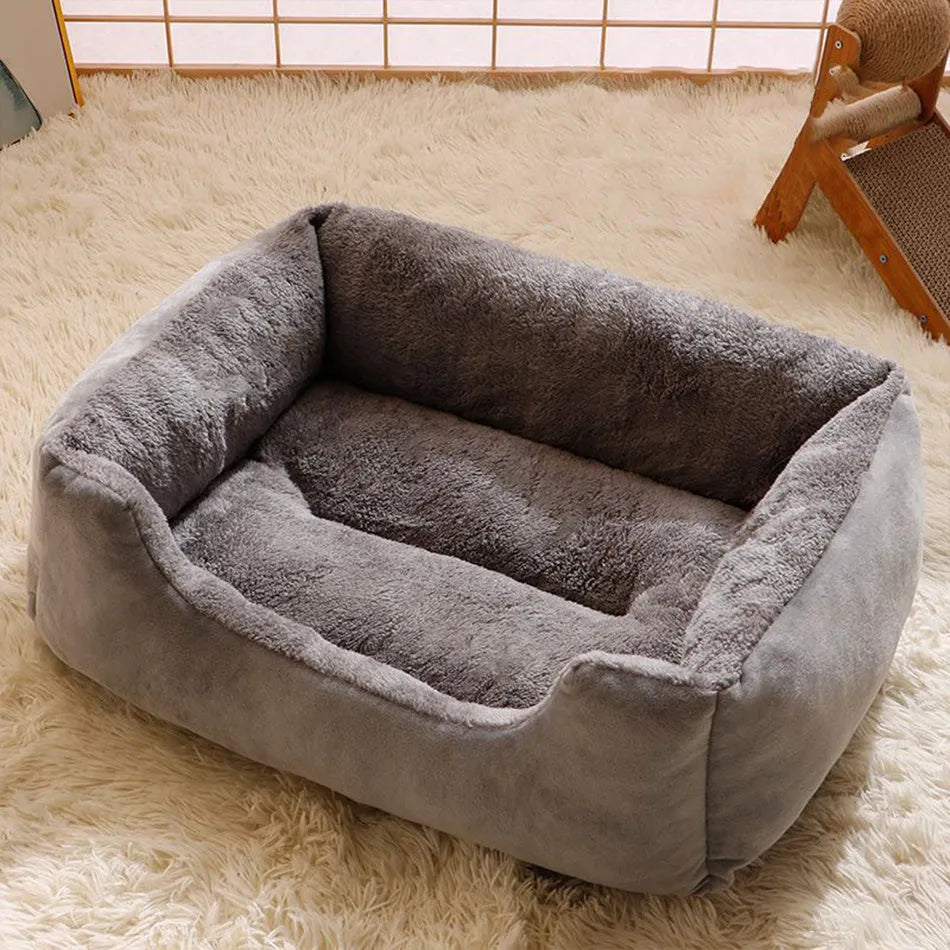 Short plush pet bed cushion shown in multiple colours and labelled sizes from S to XXL.