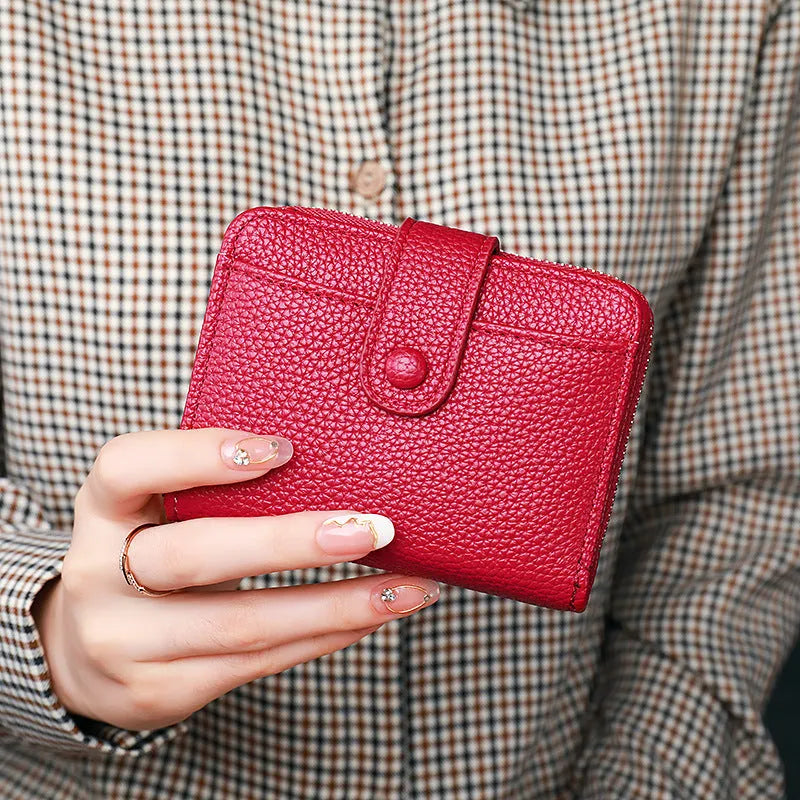 Women's lychee pattern short wallet in PU leather, shown in beige, pink, black, and red colour options.