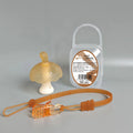 Small pink mushroom-shaped chew toy with a nano chain on a white background, inside a transparent box.