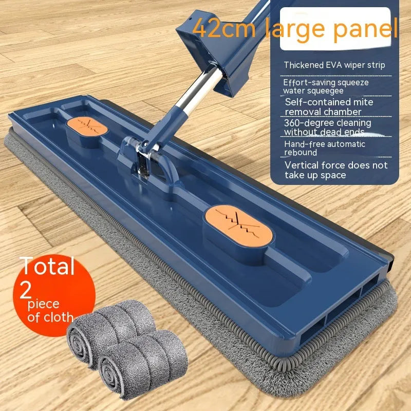 Large flat mop with long stainless steel handle and blue fine fibre cloth on hard floor