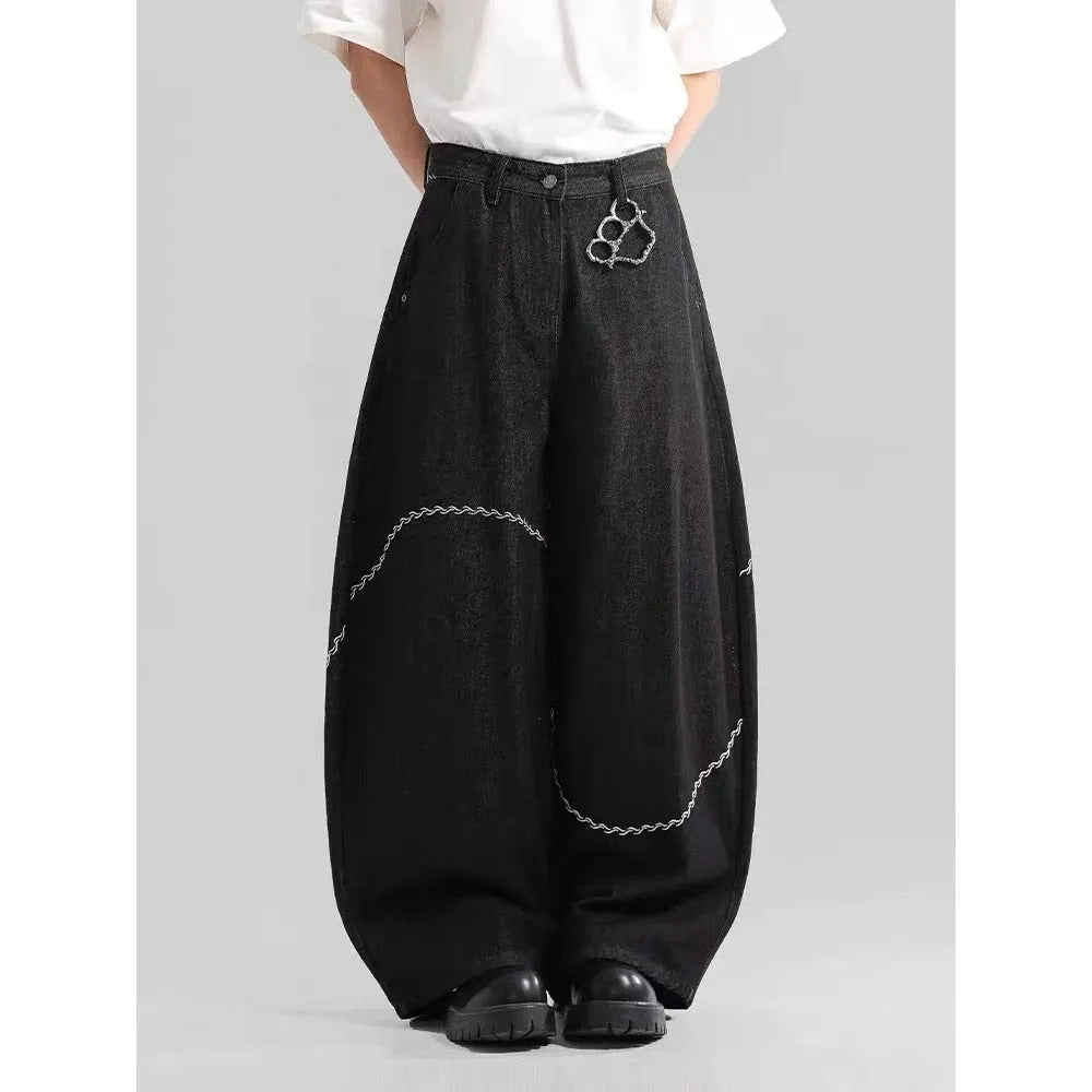 Black straight-leg denim trousers with mid-waist design and zip placket closure