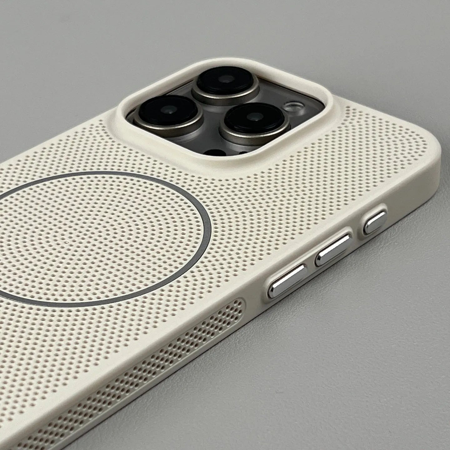 Frosted magnetic iPhone case in blue showing heat dissipation design and shockproof construction