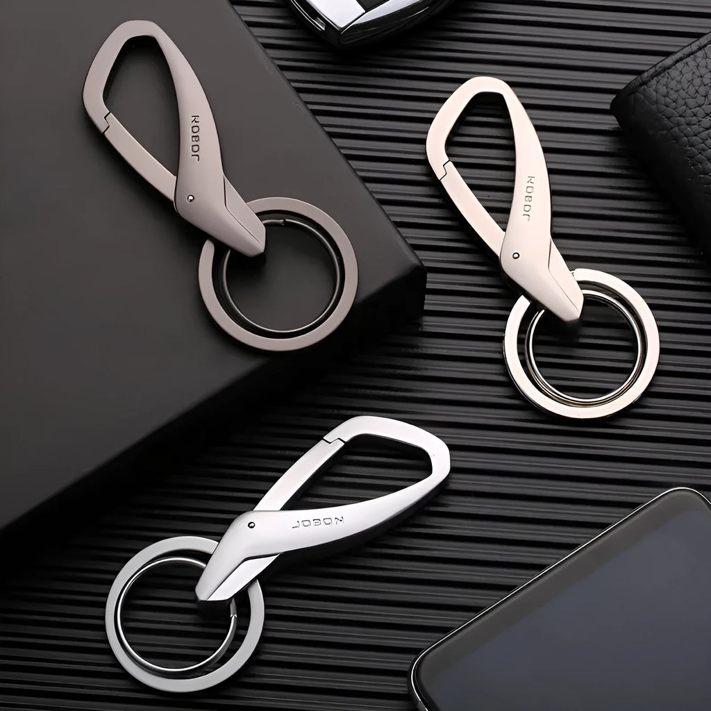 Black zinc alloy car key chain with two metal rings and a waist-hanging clip.