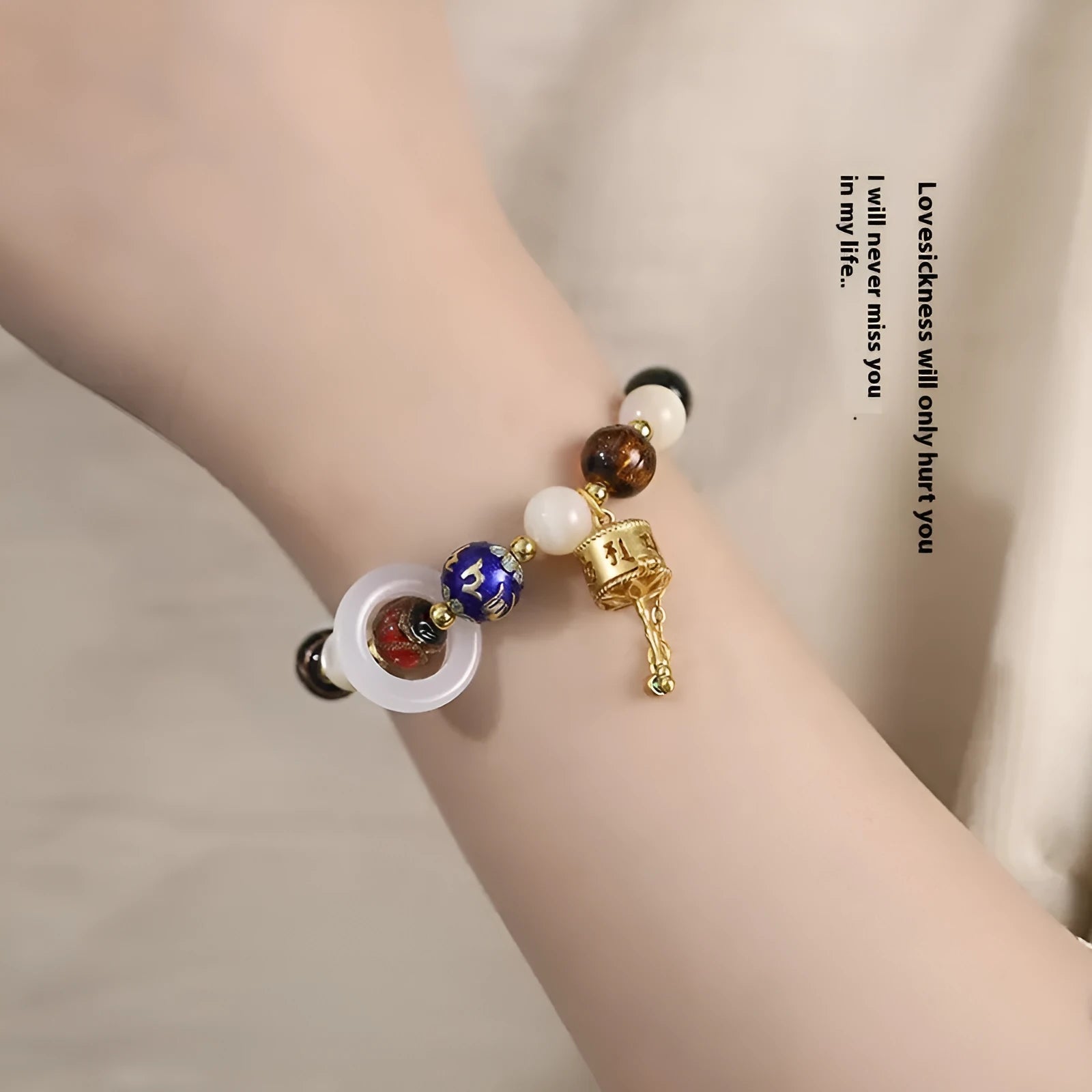 Hand-woven fragrant grey coloured glaze bracelet with sunstone or white lip shell beads