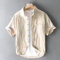 Men's apricot pure cotton casual shirt with short sleeves on a hanger