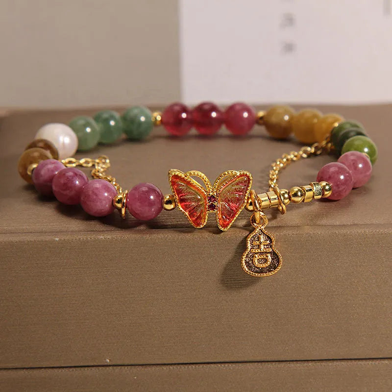 Natural jade coloured agate bracelet with a butterfly gourd design for women.