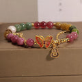 Natural jade coloured agate bracelet with a butterfly gourd design for women.
