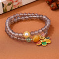Women's two-circle bracelet made with natural gray agate beads in a retro style.