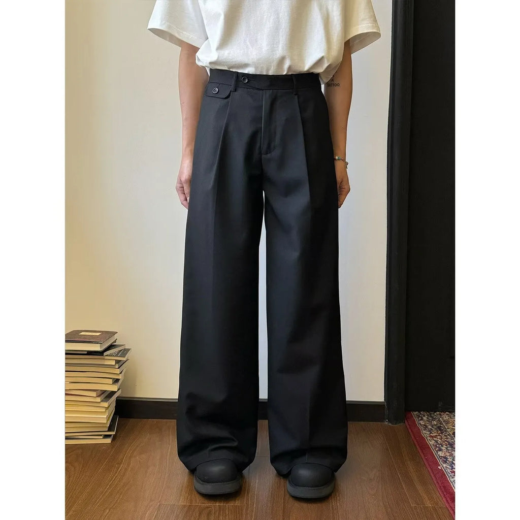 Brown men's wide-leg straight trousers with a draping casual suit style on a hanger.