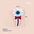 Small plush cat teaser toy with candy, eyes or skull design and feather attachment