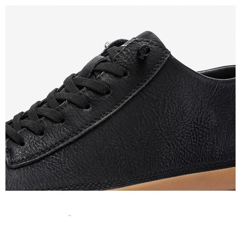 Men's black leather casual shoes with round toe, lace-up closure, and rubber soles