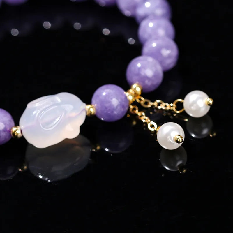 Purple aquamarine and lychee jelly agate rabbit bracelet with geometric design and round elements