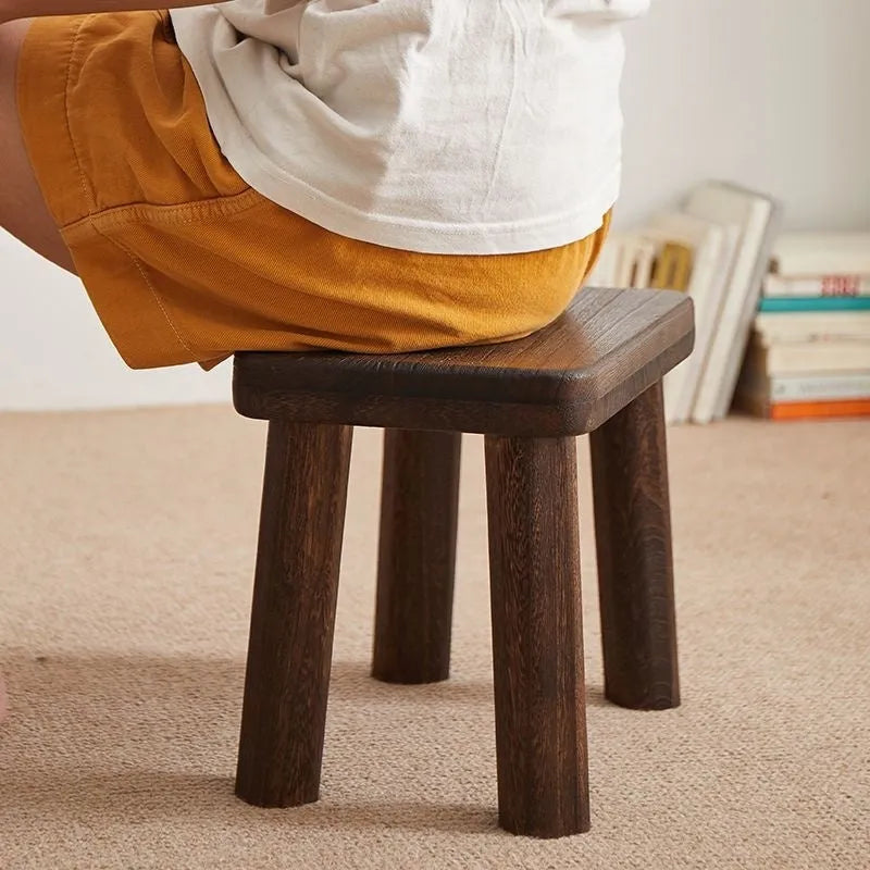 Distressed solid wood changing stool with bracket structure for shoe changing.