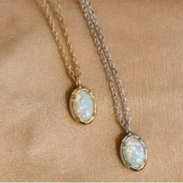 Simple geometric oval jelly opal pendant necklace on S925 silver chain in gold or white gold finish.