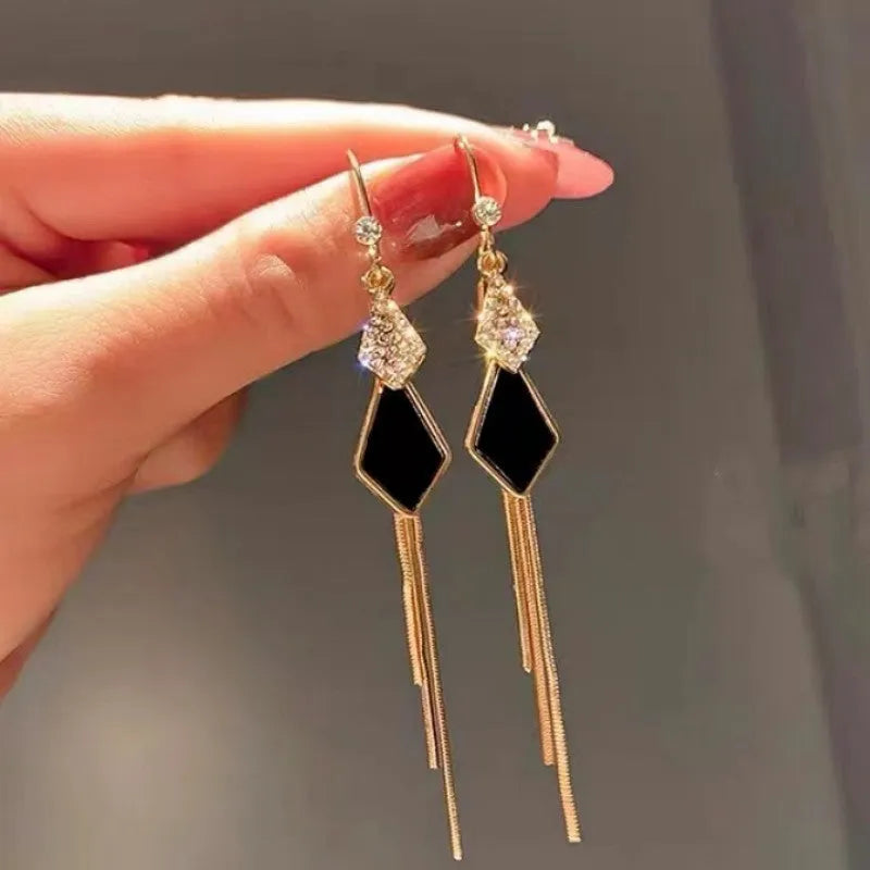 Alloy tassel strip earrings with electroplated finish in white showing Gang Diamond Ice Flower design