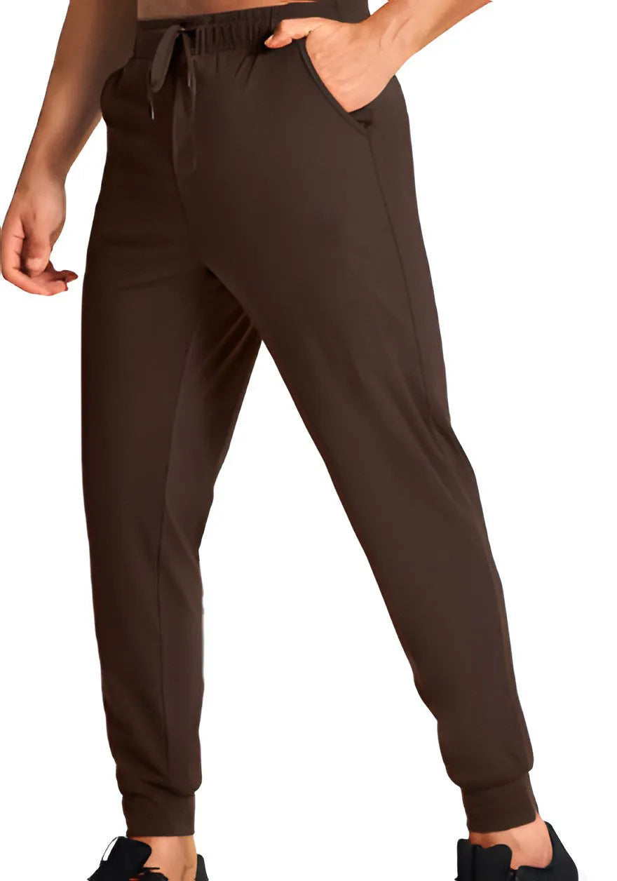 Men's loose fit polyester casual trousers shown in a solid colour, available in multiple sizes.