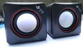 Small square black USB computer speaker with compact desktop design for PC audio