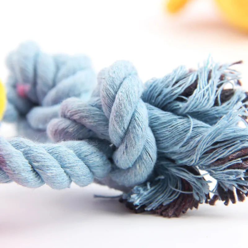 A blue deer-shaped plush dog toy with a corn grain textured surface.