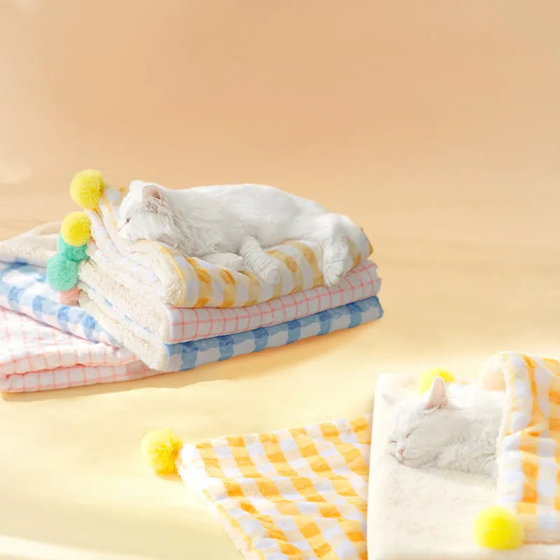 Blue coral fleece pet blanket shown on a dog bed, with size options S M L XL displayed.